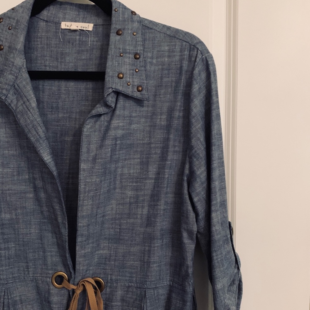 Denim vest with leather tie